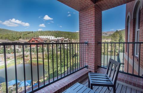 a private townhome balcony showing scenic mountain views at parry peak lofts vacation rentals in winter park colorado
