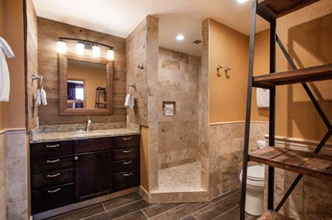 a clean, modern bathroom vanity and shower setup inside a premium condo unit at zephyr mountain lodge