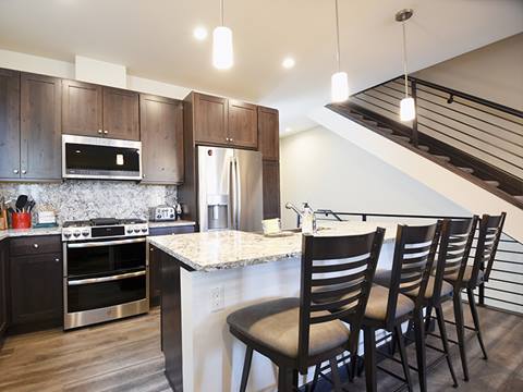 A kitchen in an Arrow Townhome vacation rental at Winter Park Resort 