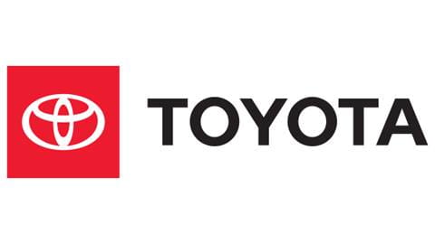 Red toyota logo with black Toyota text written