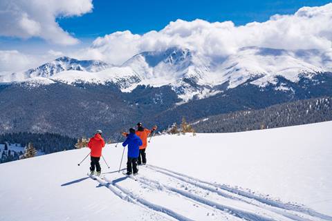 3 Skiers at Winter Park Resort on a powder day with first tracks 