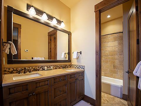 Bathroom with large mirror