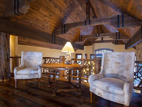 Loft area with two chairs. 
