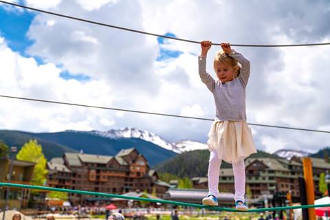 Child on ropes course at Winter Park Resort