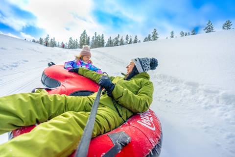 Mother and daughter tubing at Winter Park Resort Colorado