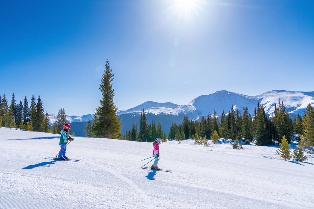 Two children skiing at Winter Park Resort